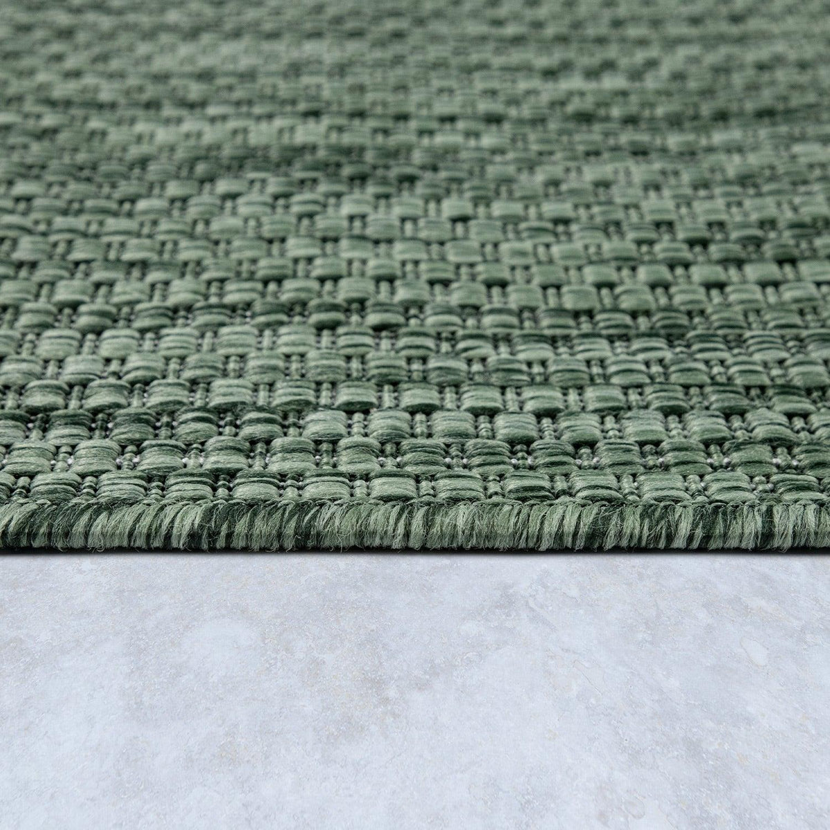 Solid Outdoor Rug for Patio or Balcony weatherproof in Mottled Dark Green