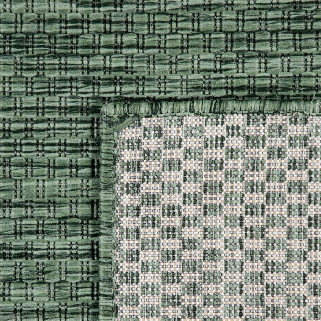 Solid Outdoor Rug for Patio or Balcony weatherproof in Mottled Dark Green