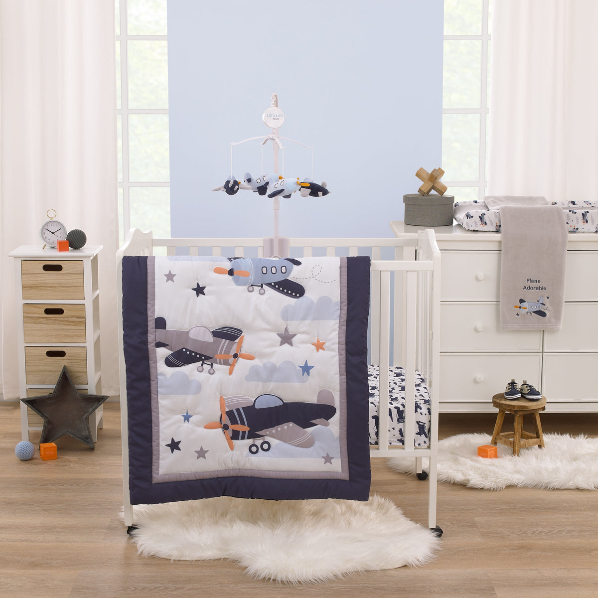 Soar High Little One Navy, Light Blue, Orange, and White Airplanes, Clouds, and Stars 3 Piece Nursery Mini Crib Bedding Set - Comforter, and Two Fitted Mini Crib Sheets